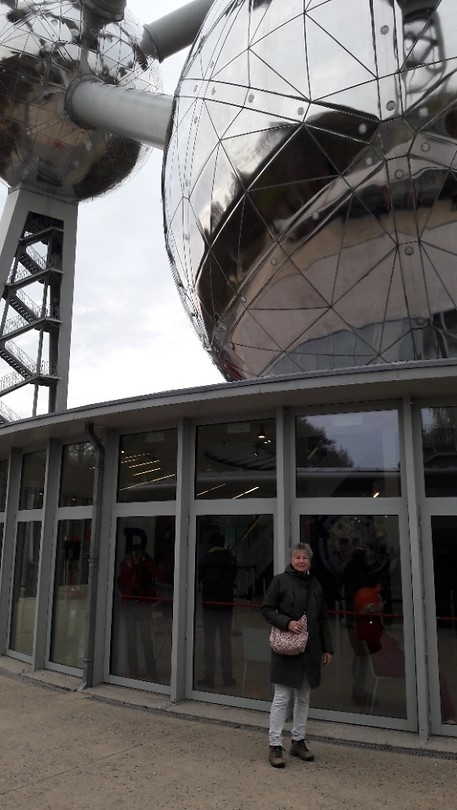 Met trap of lift? Of buiten-staan(-der)???