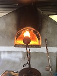 De bakoven wordt aangestoken