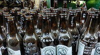 Biertuin...flesjes met boodschappen