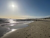 Terug over het strand