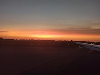 Zonsondergang vanuit vliegtuig