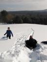 sledding in front of the Main House