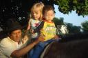 Alexandra helping out with Miguelito's therapy