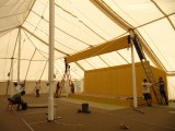 Putting up the base of the shrine itself in the big shrine tent