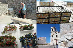 Peniscola, kerk, onderkant balkonnetjes, blommekes, en Frank die de fietsen op slot zet