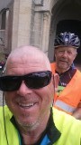 two boys on bike.