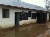 Dumbule school bij regen