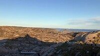Lindesnes fyr met wind op de achtergrond