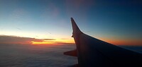 Zonsondergang vanuit het vliegtuig