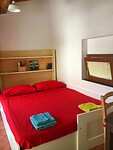 Slaapkamer in mini huisje