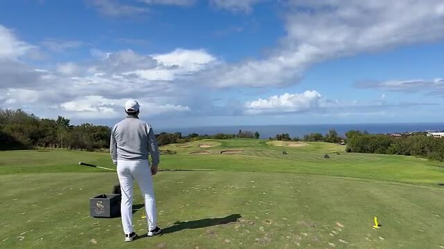 Playing golf at Pezula