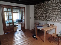 Leefruimte met daarachter de slaapkamer