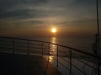 Zonsondergang op zee