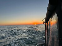 Opkomst van de zon bij vertrek uit Chipiona
