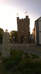 Munsterpoort met een oude romeinse wegaanduiding. (Witte steen voorgrond)