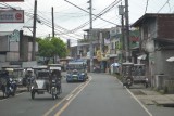 Jeepney en een tricycle