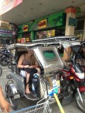Met de tricycle