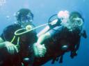 499 Bunaken, Under Water Buddy breathing with Laura