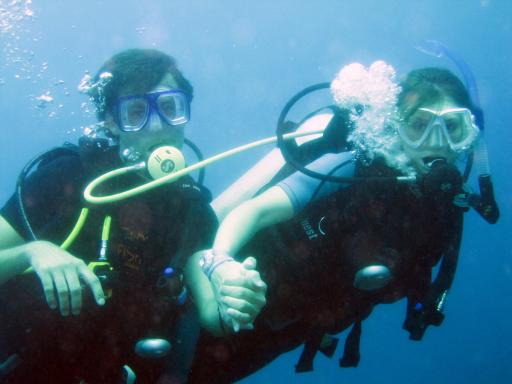 499 Bunaken, Under Water Buddy breathing with Laura