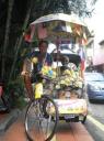 Frank en onze gids op de trishaw