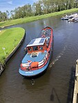 28 - Achterwaarts de brug door en de haven in