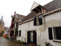 huizen op de muur
