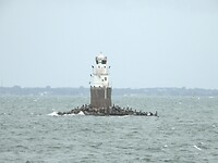27. Vuurtoren in zee