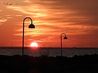 112. Zonsondergang aan zee