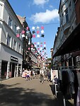 211. De winkelstraat van Odense met HCA hoedjes