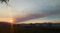 Bosbranden verduisteren de zonsondergang