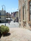 Straat en plein Gastiglione Del Lago
