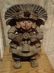 Oaxaca. Mens met masker, en wel Xipe Totec. 900 na Chr.