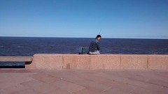 All an Uruguayan need on a sunday afternoon: sun, thea and a fishing rod