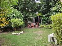 Achtertuin/ Patio trasero.