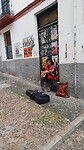 Straatmuzikant in de Arabische wijk van Granada
