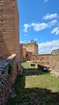 Een kijkje op de vestigingsmuren van het Alcazaba