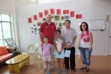 met de directeur op de foto