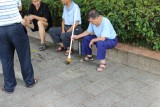 Kalligraferen oefenen met water