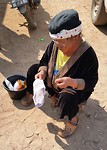 Hmong refugee at work