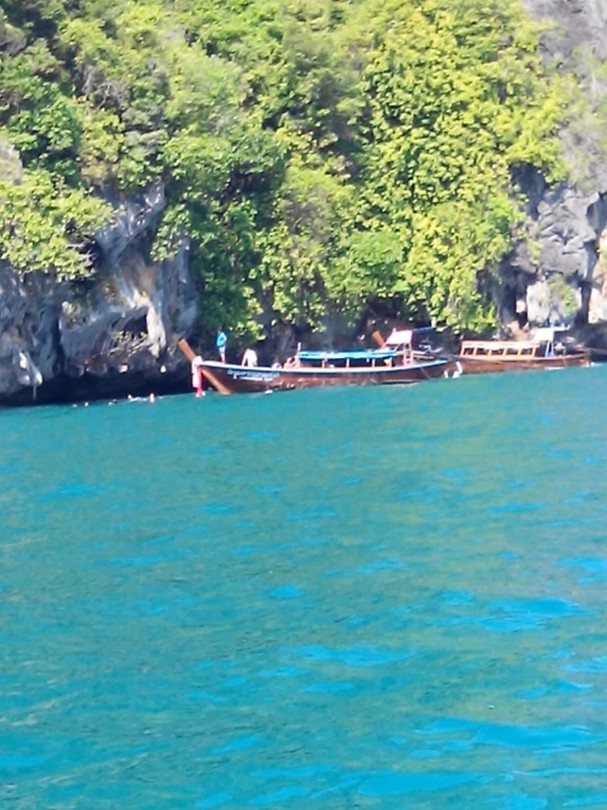 First location , start of the snorkeling,  jumping out of the longtail boat.