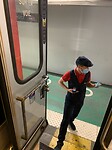 Meneer van de SNCF onderaan de trap