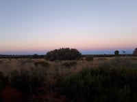 Zonsondergang na bezoek Uluru