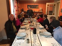 Het koor met ah hoofd de kok/organisator
