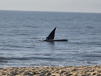 Marracuene: lokale visser in een dhow