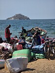 Mozambikanen, wachtend op de boot