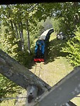 Smalspoor stoomlocomotief met veel wagons