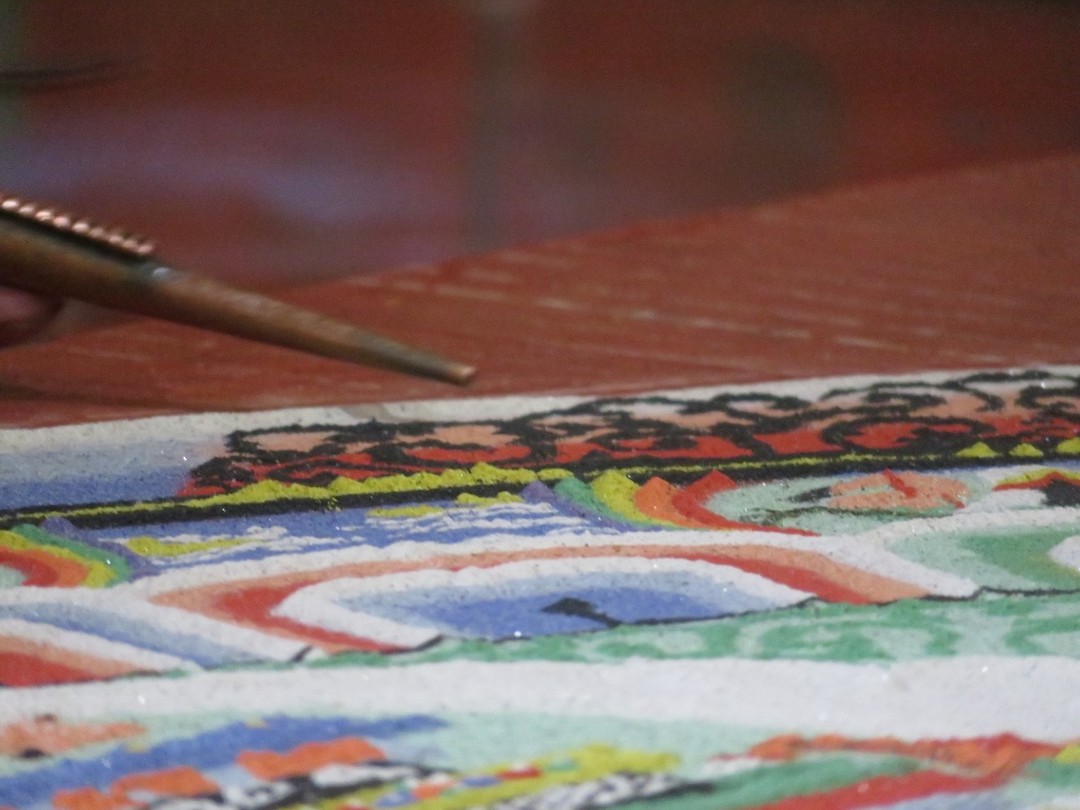Monk making a mandala