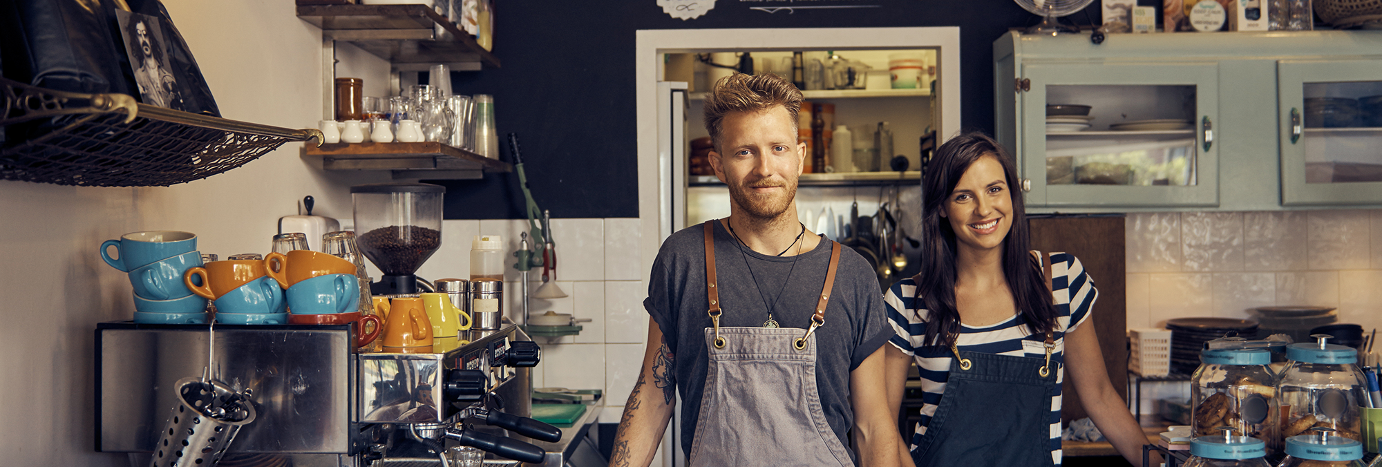 Coffee Shop POS smiling cafe owners