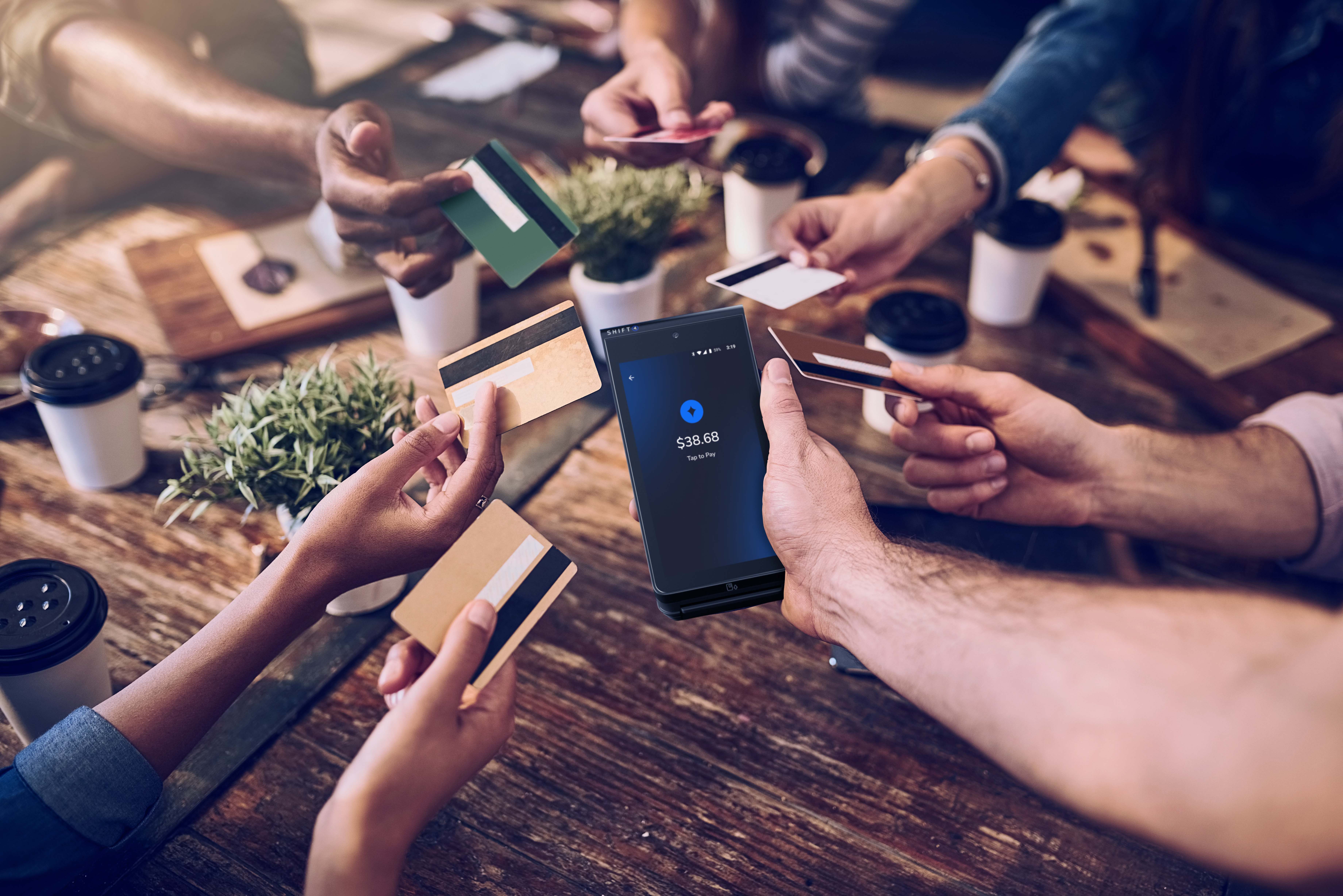 Mobile payment system mobile ordering system customers paying tableside with credit card and SkyTab Mobile device