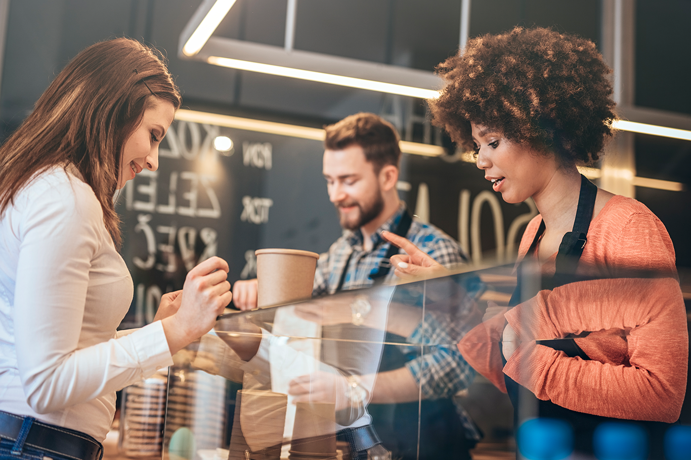 Restaurant POS system quick-service restaurant customers ordering at the counter